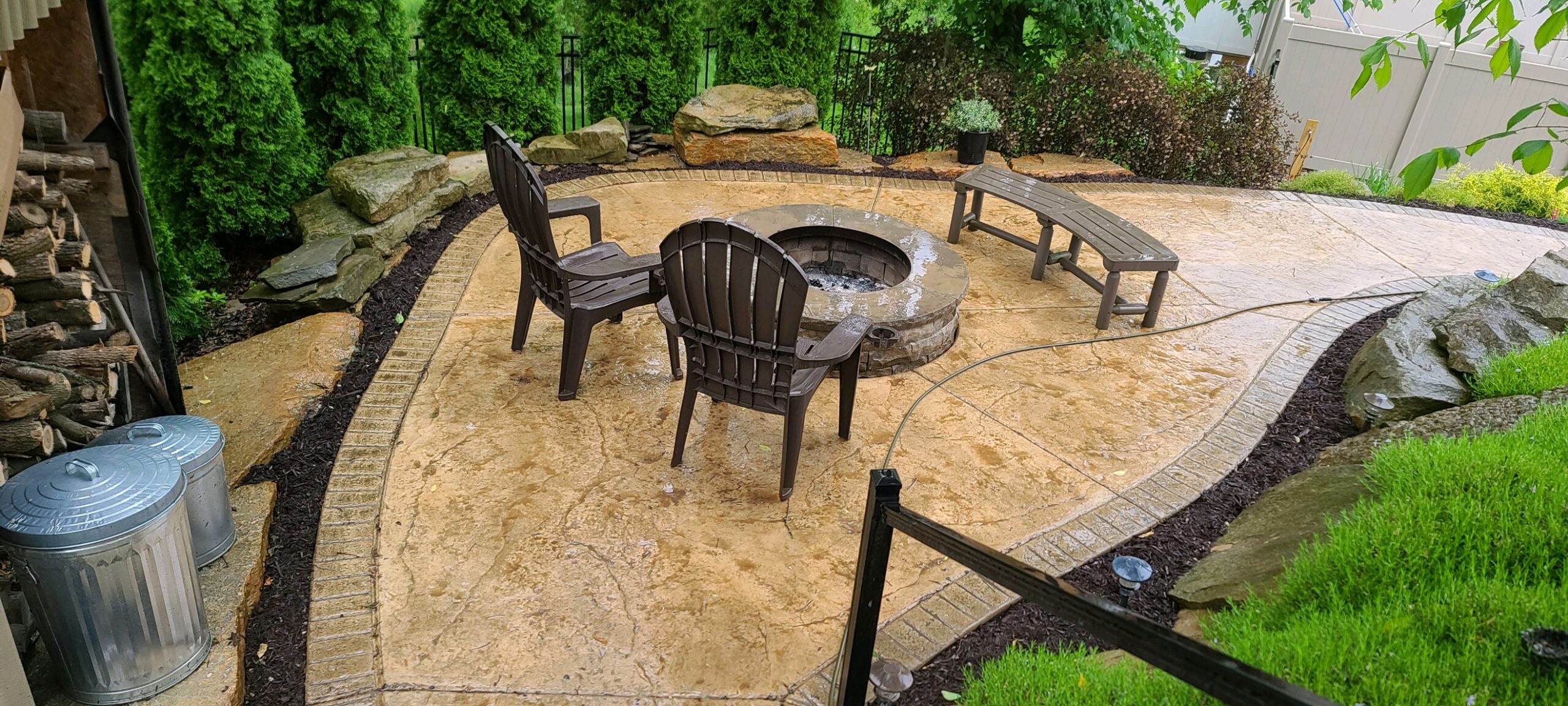 landscaping and outdoor fire pit and grill