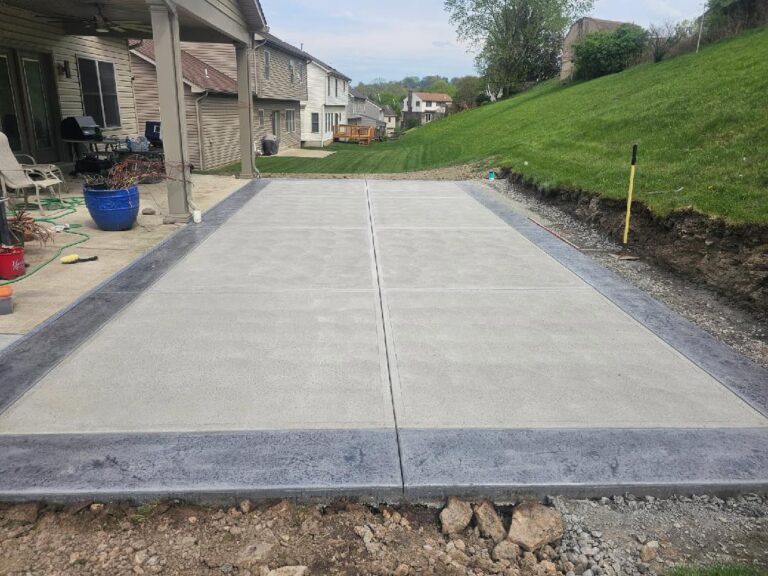 stamped concrete patio with accent borders