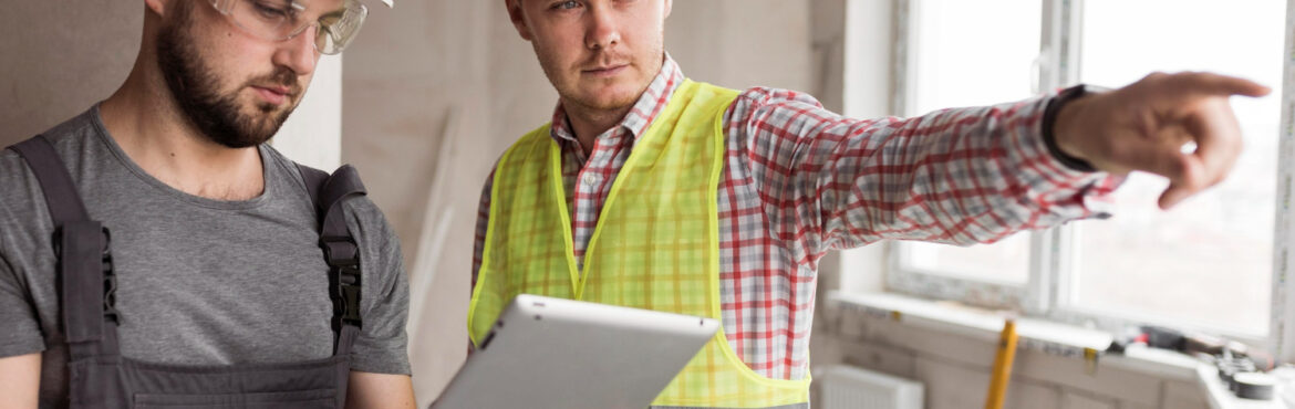 two men working at a construction site