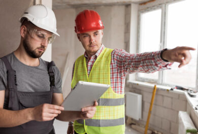 two men working at a construction site