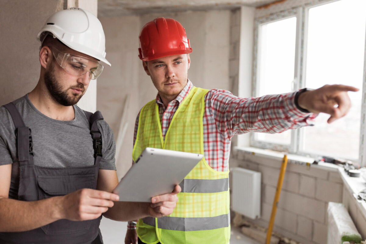 two men working at a construction site