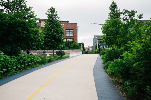 Smooth paved road stretching into the distance.