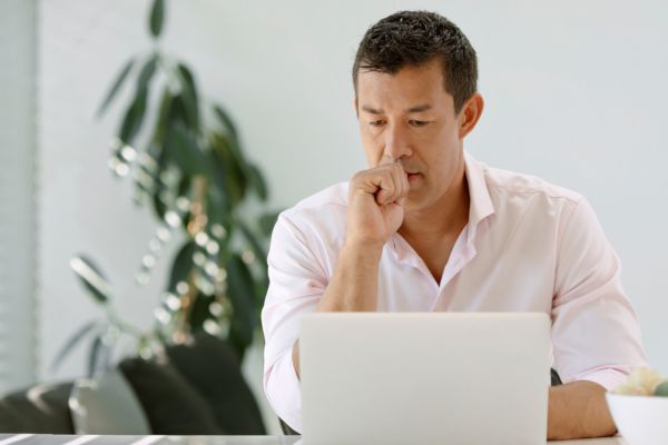 Man looking up nearby residential construction services