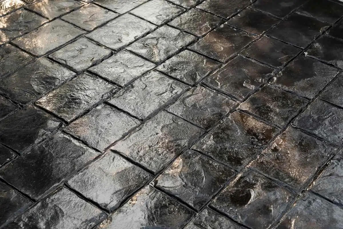 Stamped concrete driveway in a residential front yard.