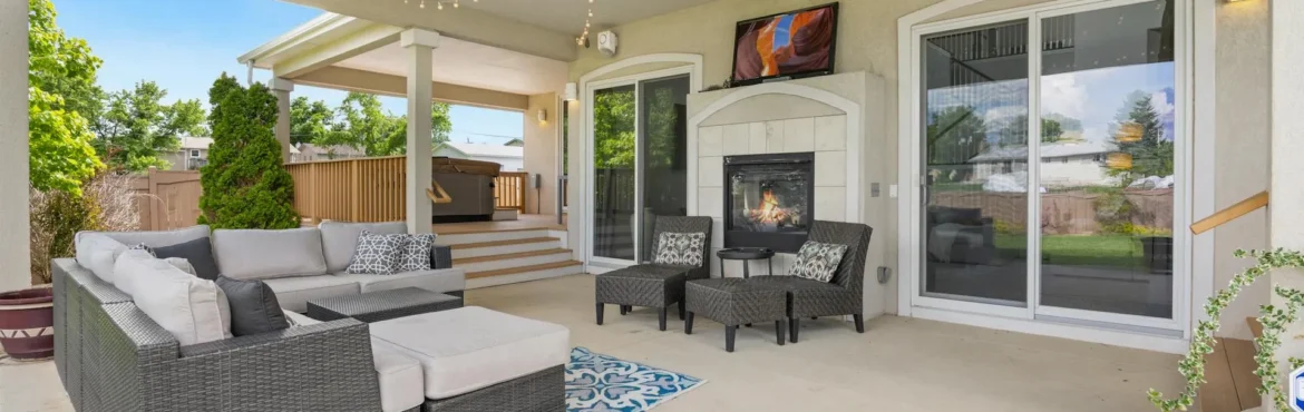A home with an exterior backyard living area