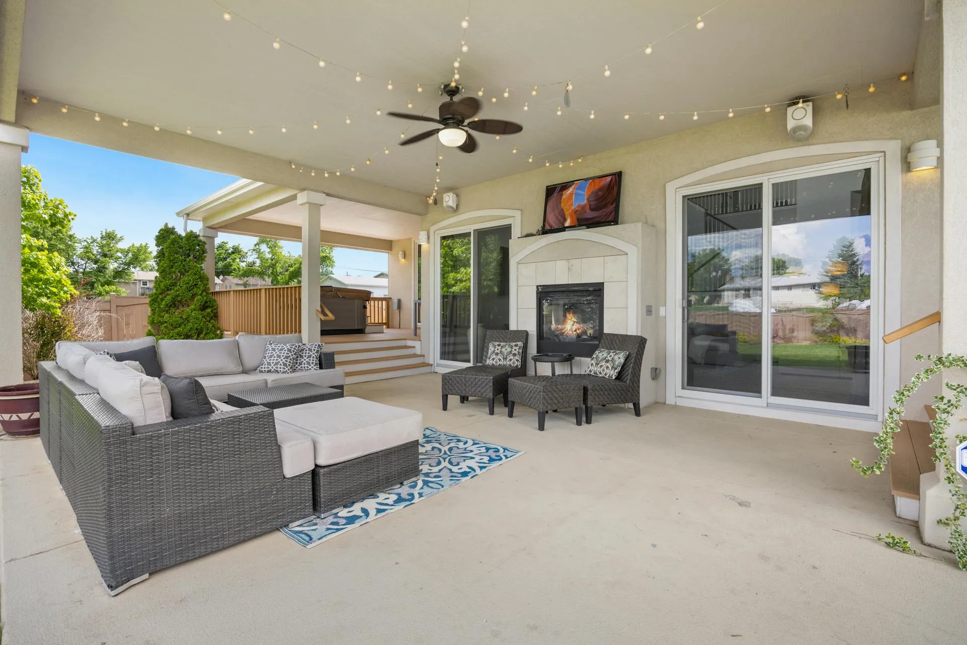 A home with an exterior backyard living area