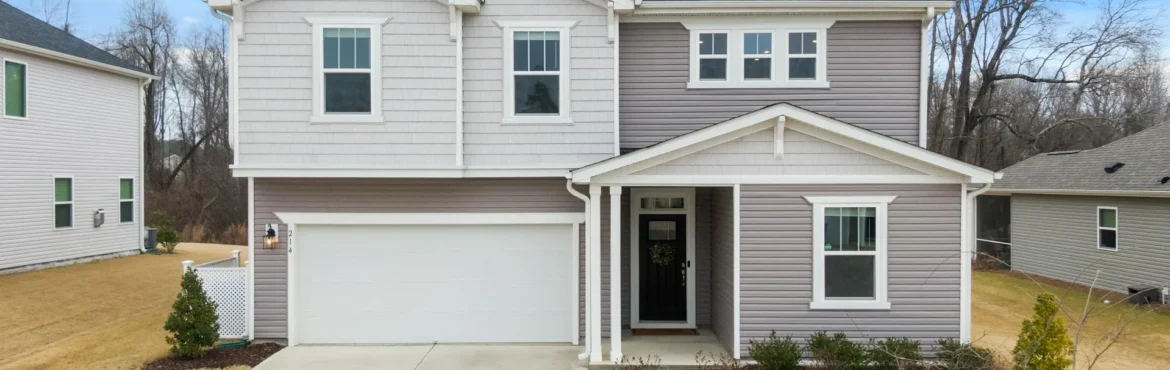 A newly renovated concrete driveway of a house