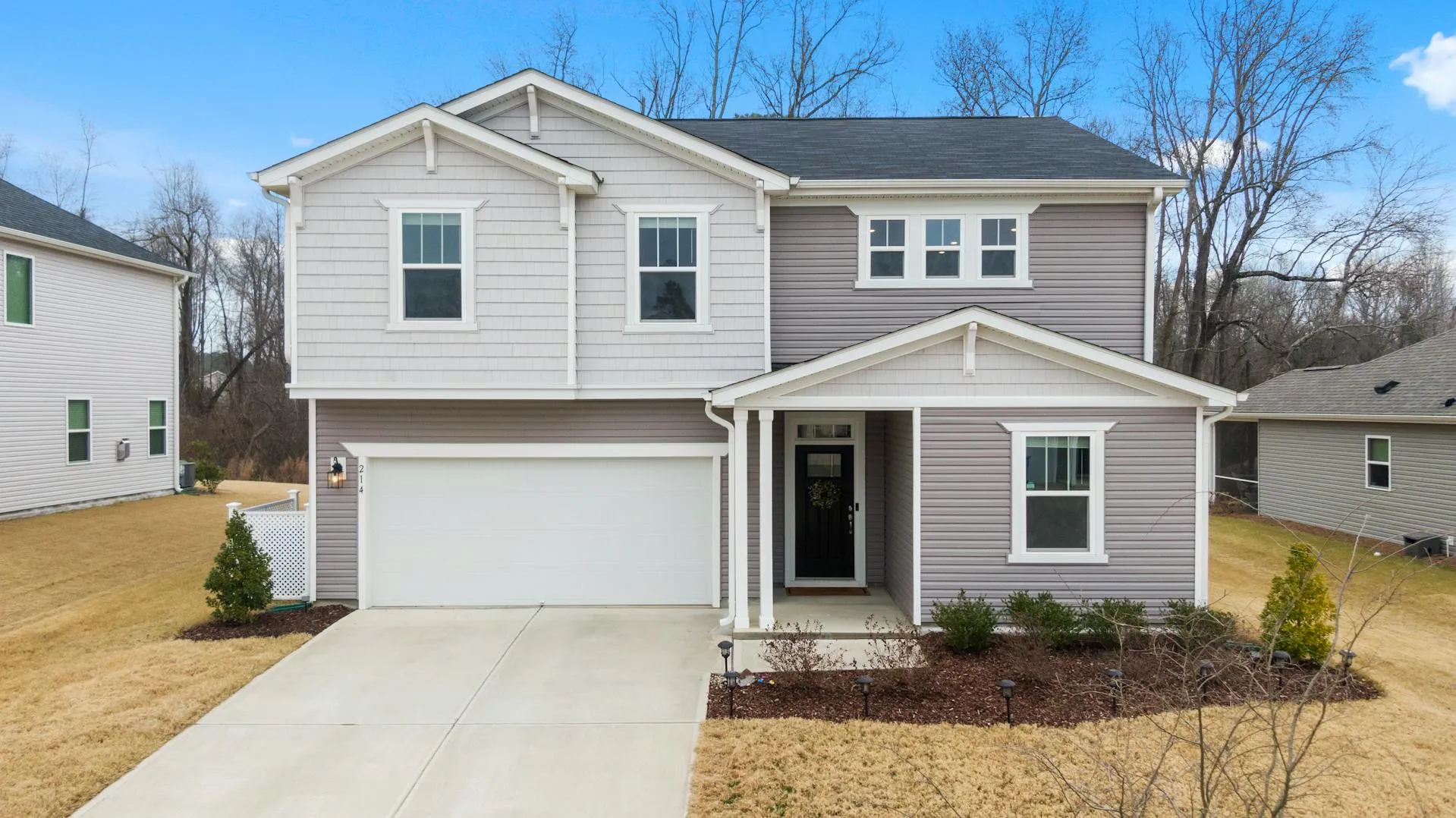 A newly renovated concrete driveway of a house