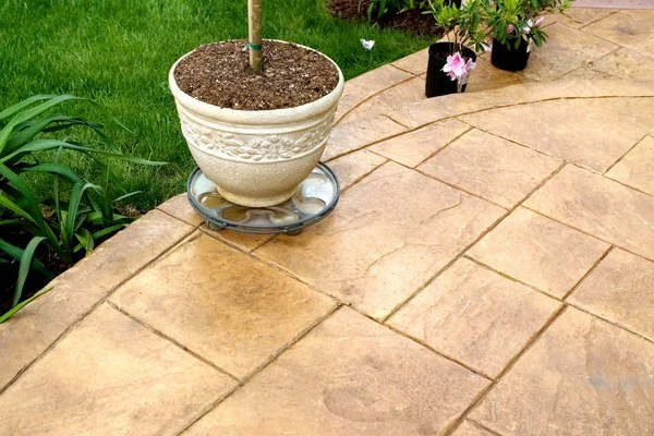 Concrete patio with stamped concrete finish.
