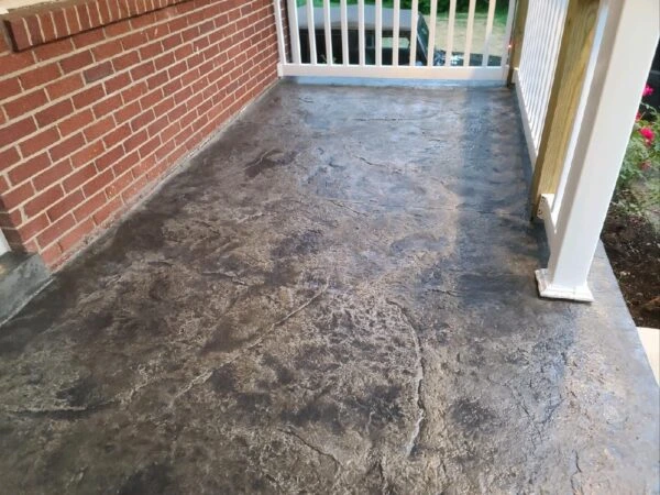 Home entrance with stamped concrete surface