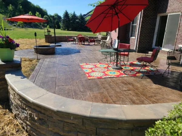 Concrete patio area directly behind the house.
