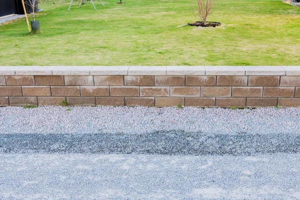 Stone retaining wall designed for sitting