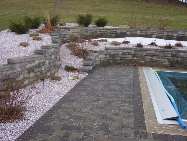 Landscaping project featuring a multi-level retaining wall.
